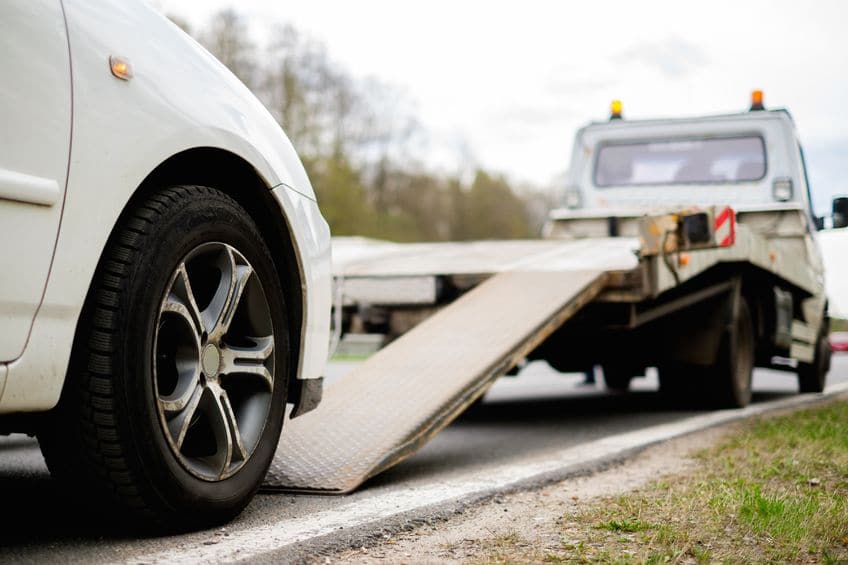 Tow Truck Loading Broken Car on Roadside | Marietta Wrecker Service