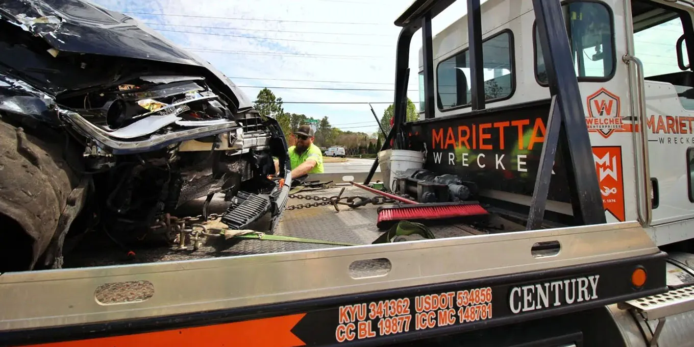 Loading Wrecked Vehicle on Tow Truck | Marietta Wrecker
